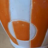 Old enamelled ceramic jug