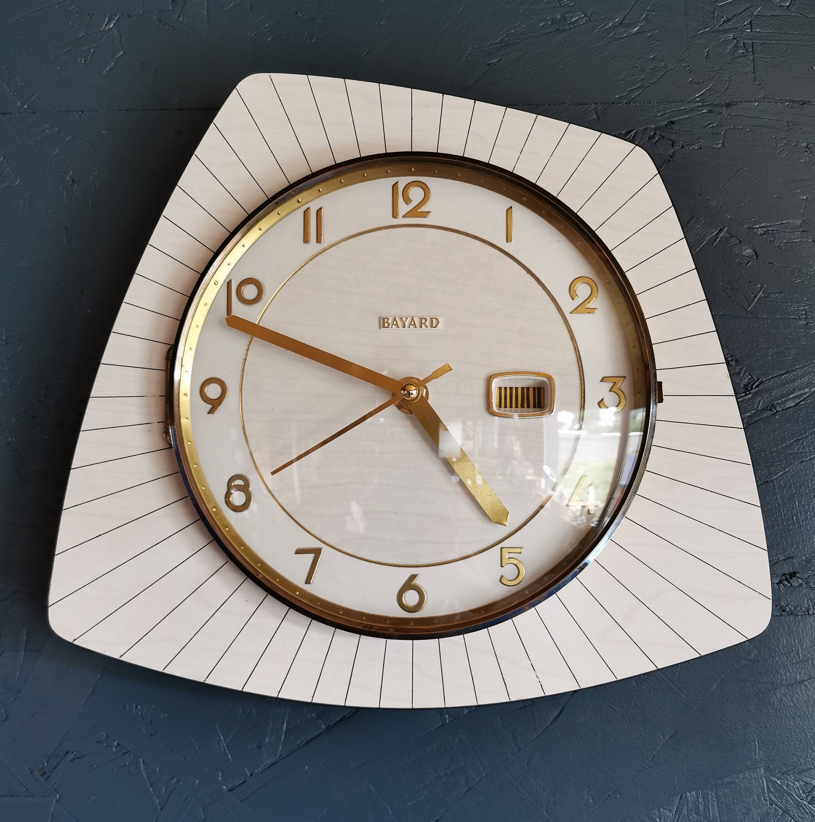 Vintage formica clock silent asymmetrical wall pendulum "Bayard wood lines"