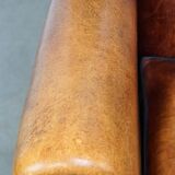 Sheepskin leather chair with a beautiful patina