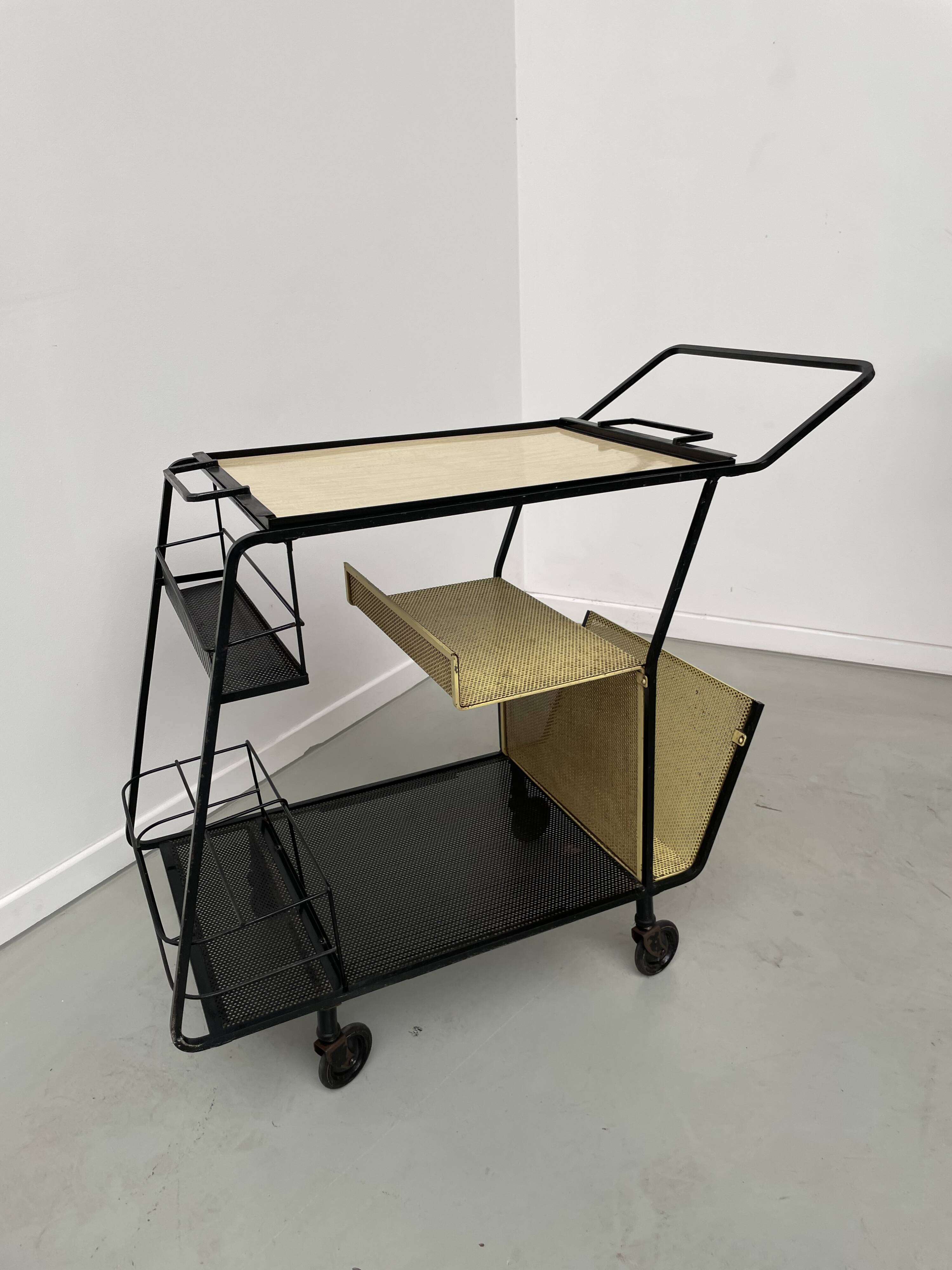Perforated metal serving trolley in the Mathieu Matégot style