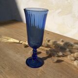 Champagne flutes in blue glass
