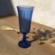 Champagne flutes in blue glass