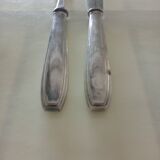 Serving cutlery in silver metal
