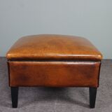 Schapenleren armchair and studio lounge stool