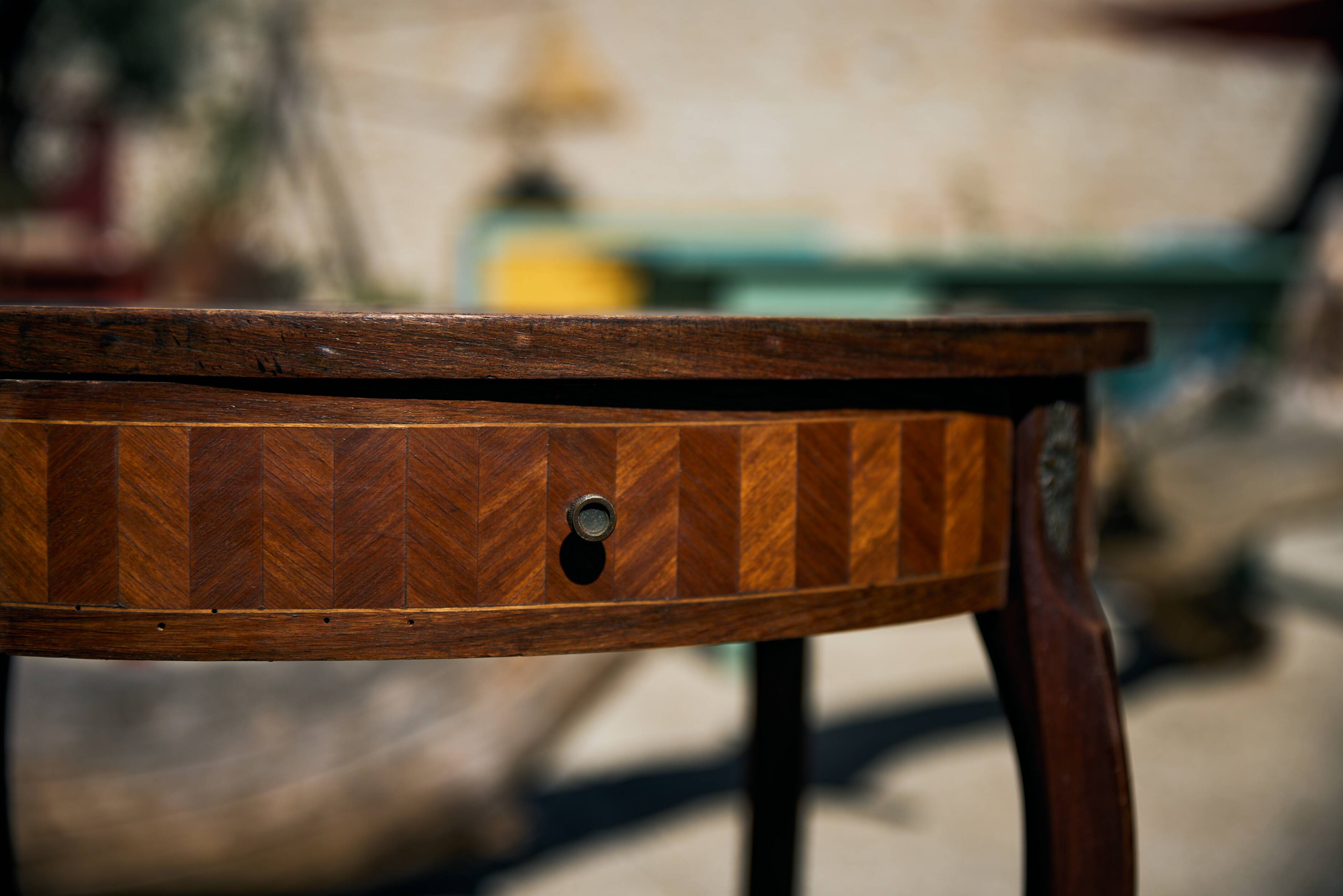 Oval coffee table in cube marquetry and bronze, Louis XV style.