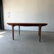 Rectangular extendable table in Scandinavian design made of solid teak.