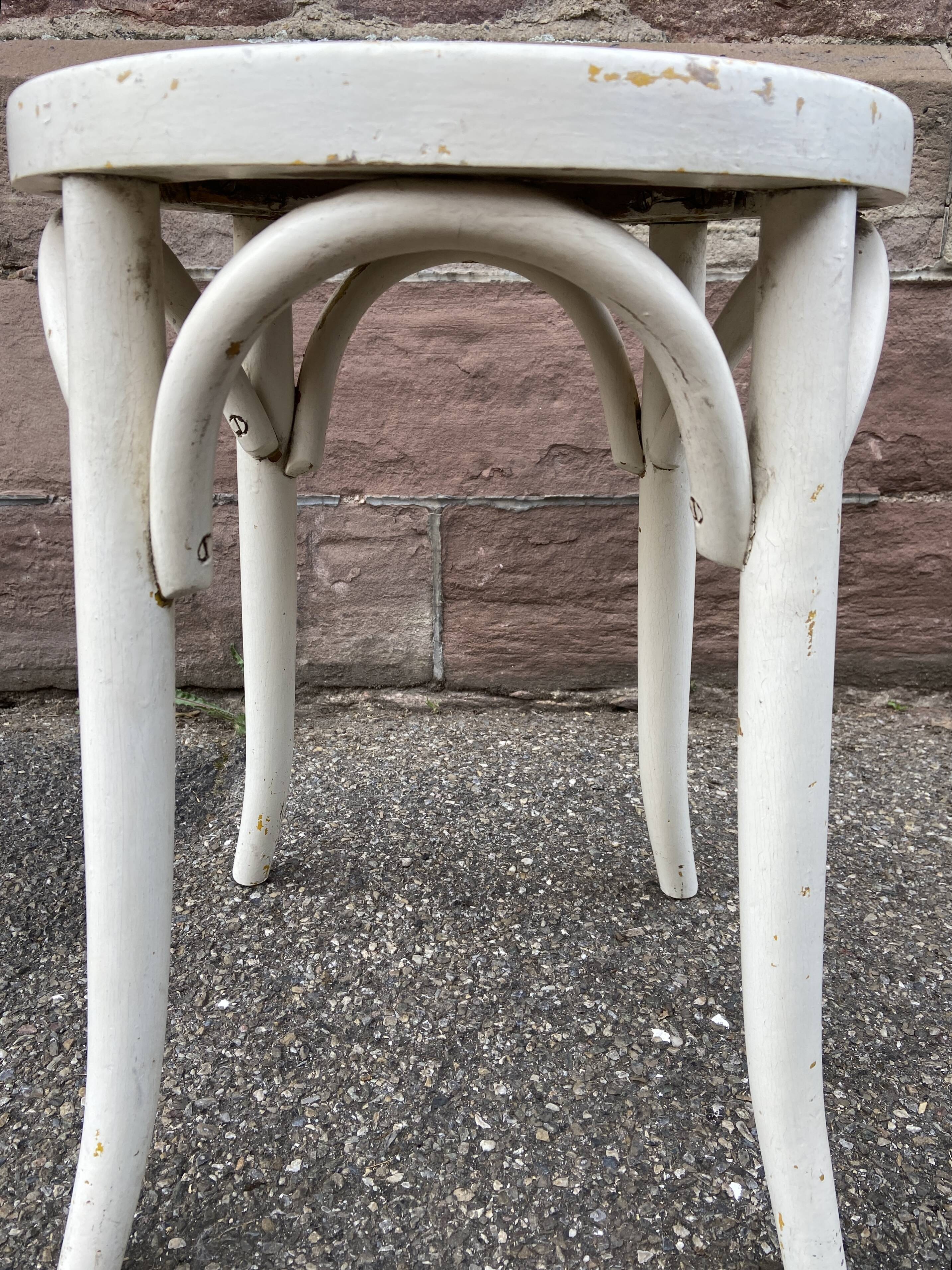 Vintage curved wooden stool