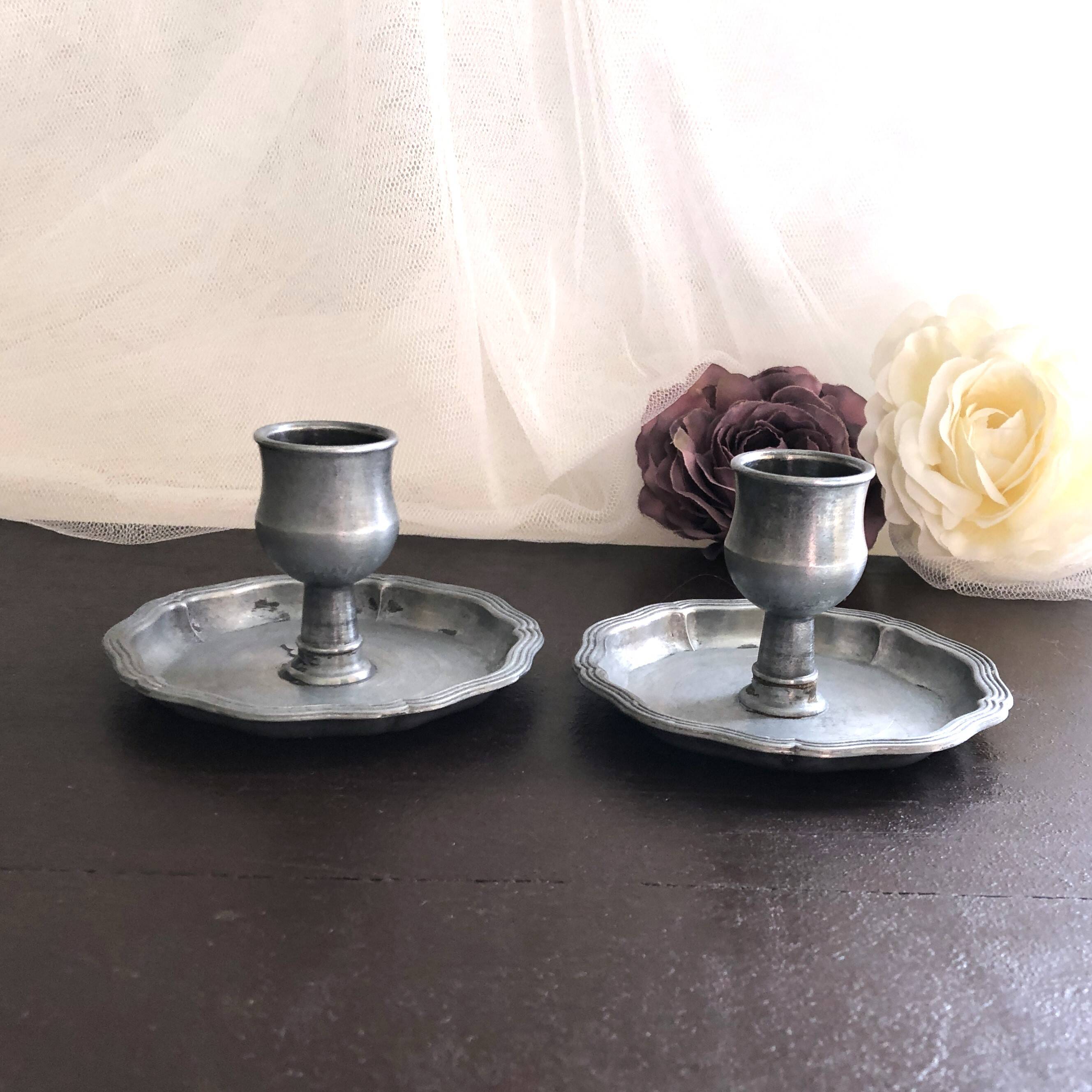 Pair of pewter table candlesticks