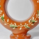 Circular glazed terracotta gargoulette
