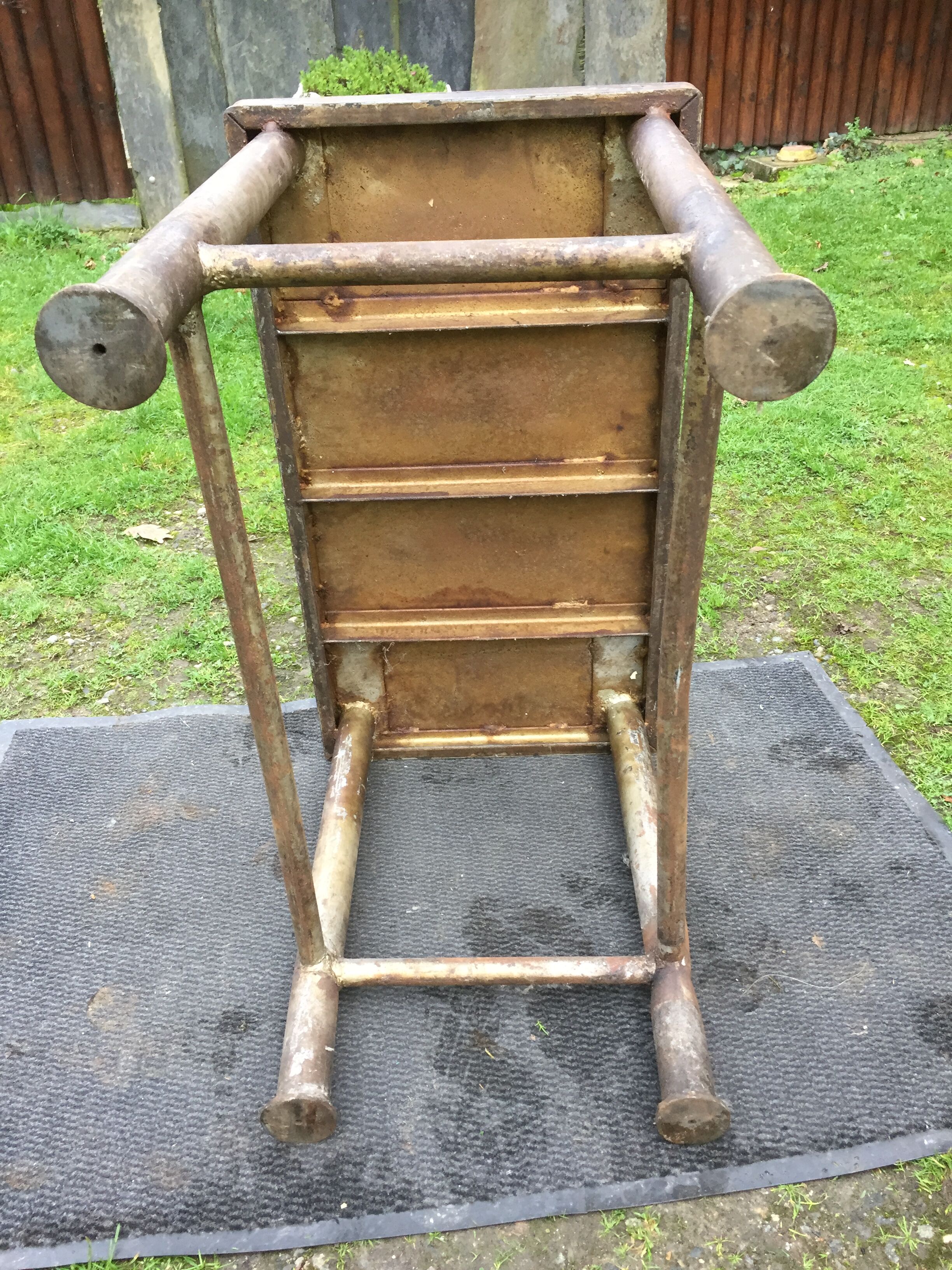Vintage metal table from an industrial workshop for a makeover