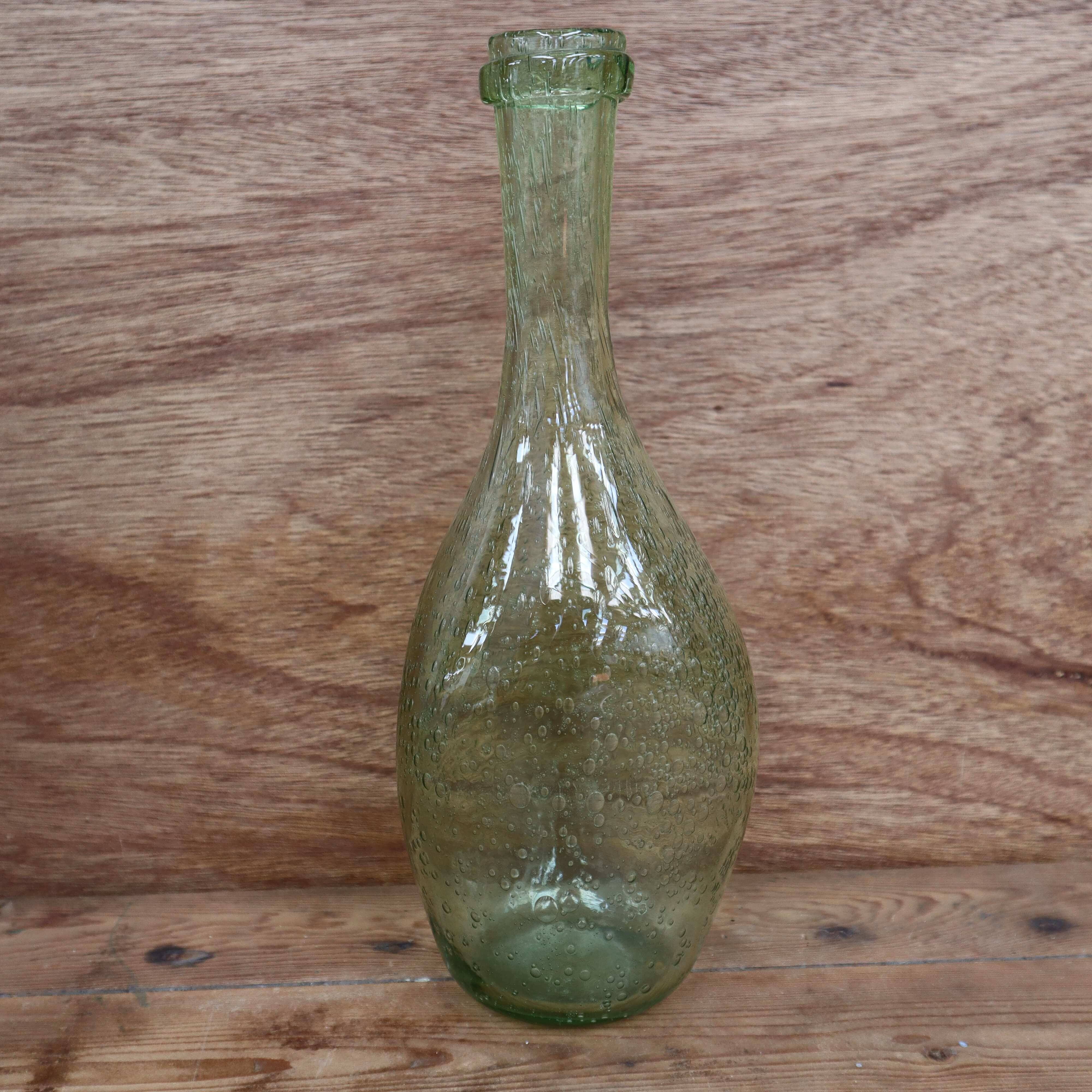 Biot water green colored bubble blown glass bottle