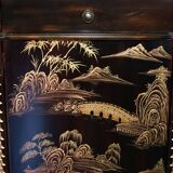 Contemporary Chinese buffet with a marble top and space for a mini-fridge.