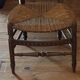 Antique nursing chair in wood and straw from Brittany (late 19th / early 20th century)