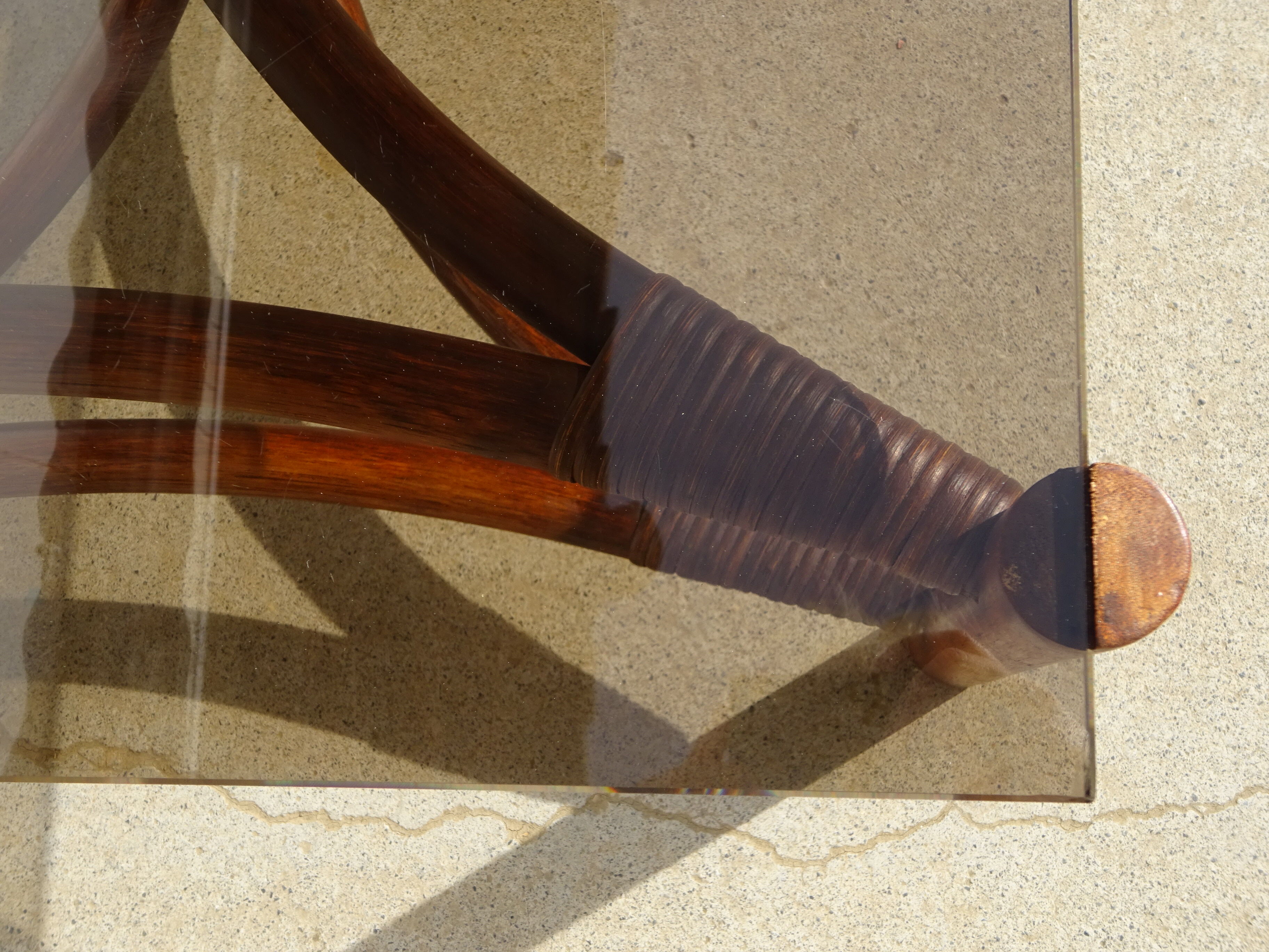 Glass and rattan coffee table