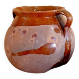 Old cauldron in pottery