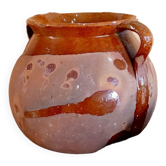 Old cauldron in pottery
