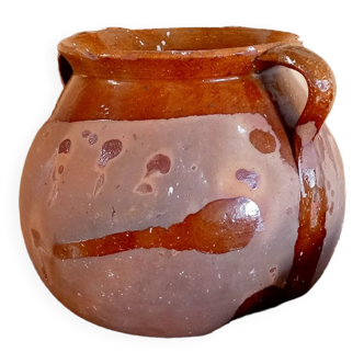 Old cauldron in pottery
