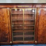 Important flamed mahogany library in Empire style from around 1900.