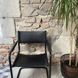 Armchair in black lacquered metal