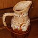 Flaming pitcher-scale ceramic barrel-shaped from the Faiencerie Revol