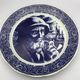Blue enamelled earthenware wall plate with fisherman decor, Boch La Louvière, Belgium