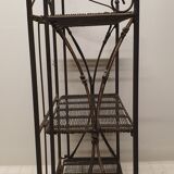 Solid wrought iron and wicker shelf