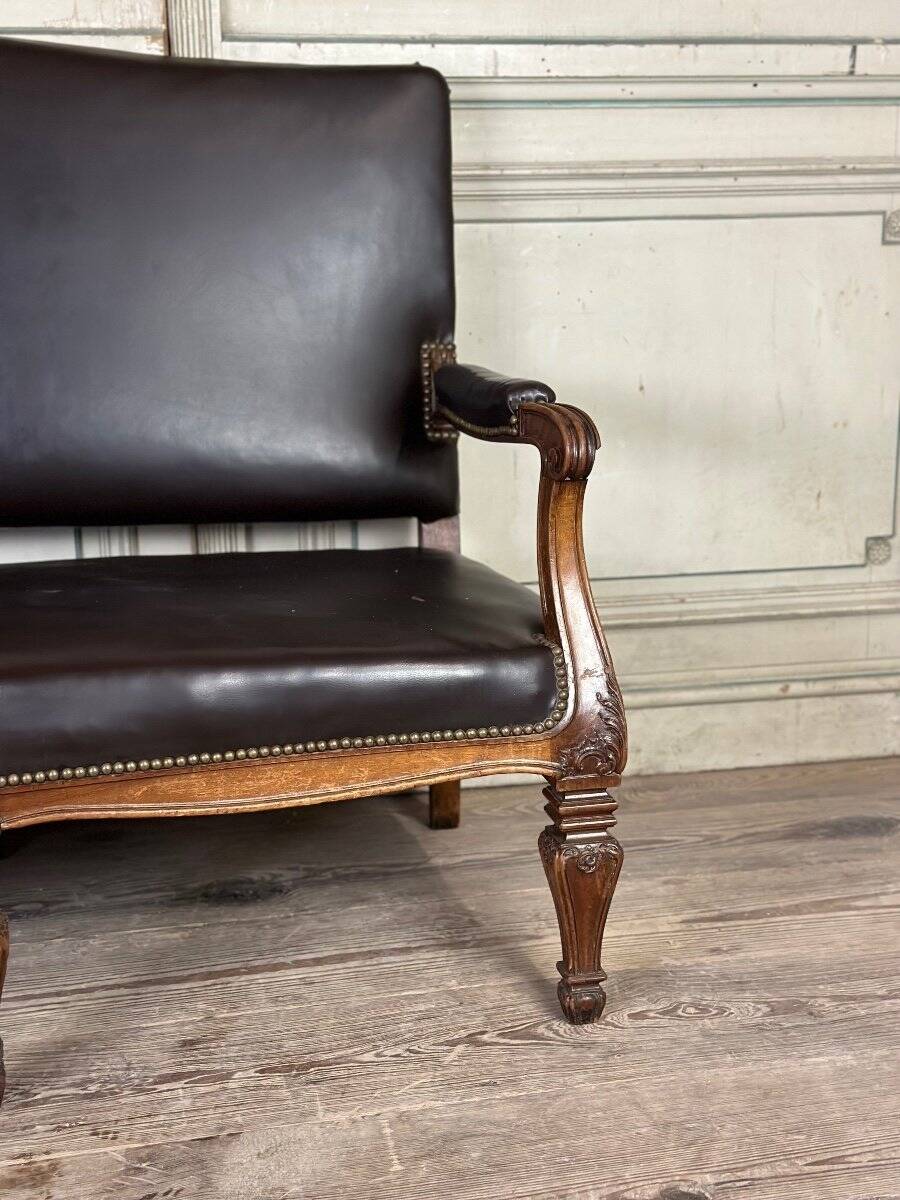 Napoleon III style bench in carved walnut, synthetic leather circa 1880