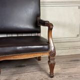 Napoleon III style bench in carved walnut, synthetic leather circa 1880