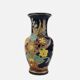 Large multicoloured ceramic vase with floral decoration signed NT.