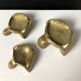 Suite of three bronze "ray"