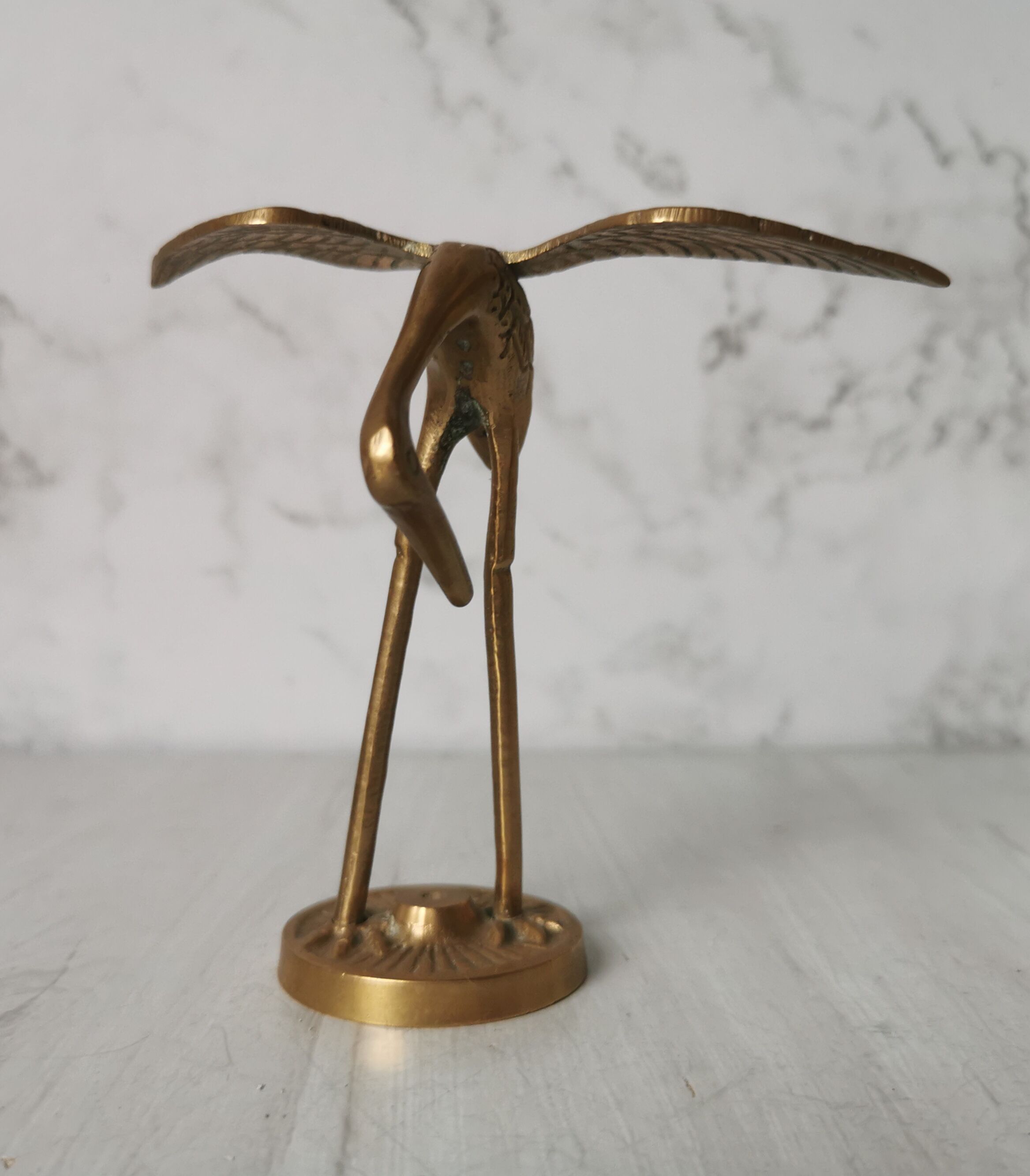 Brass heron