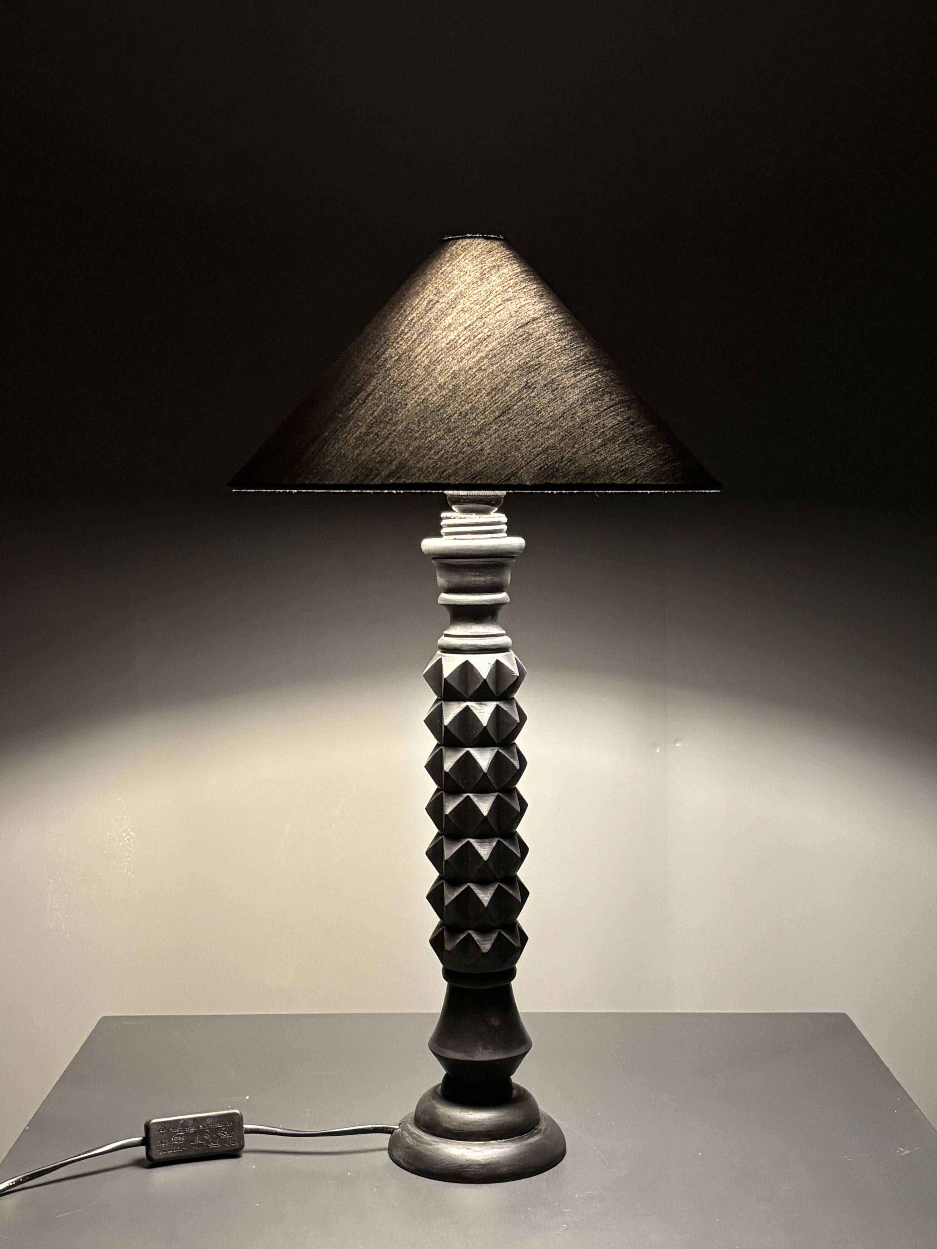 Brutalist wood turned ebonized table lamp in the style of Charles Dudouyt
