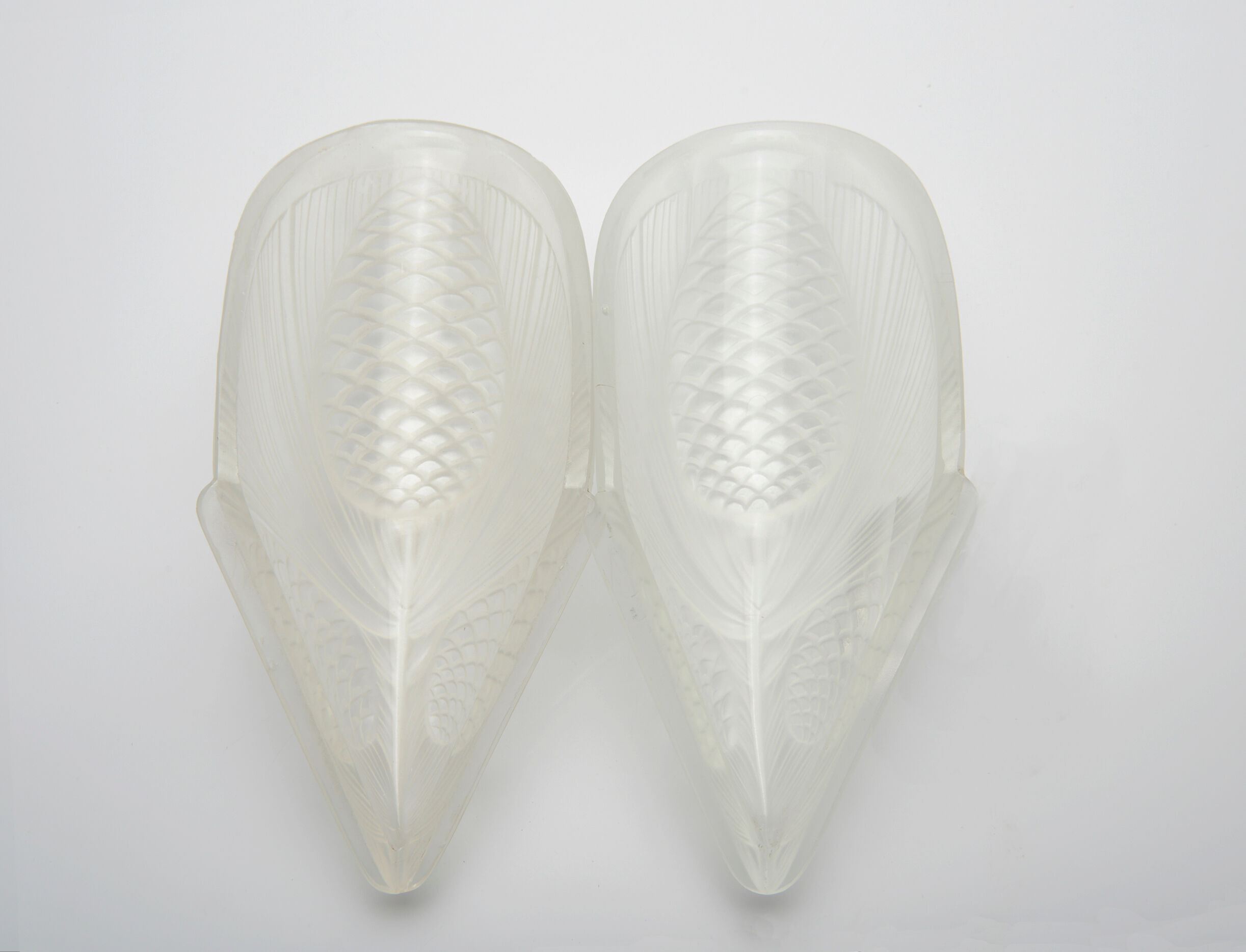 Pair of art deco wall lamps with pine cone pattern