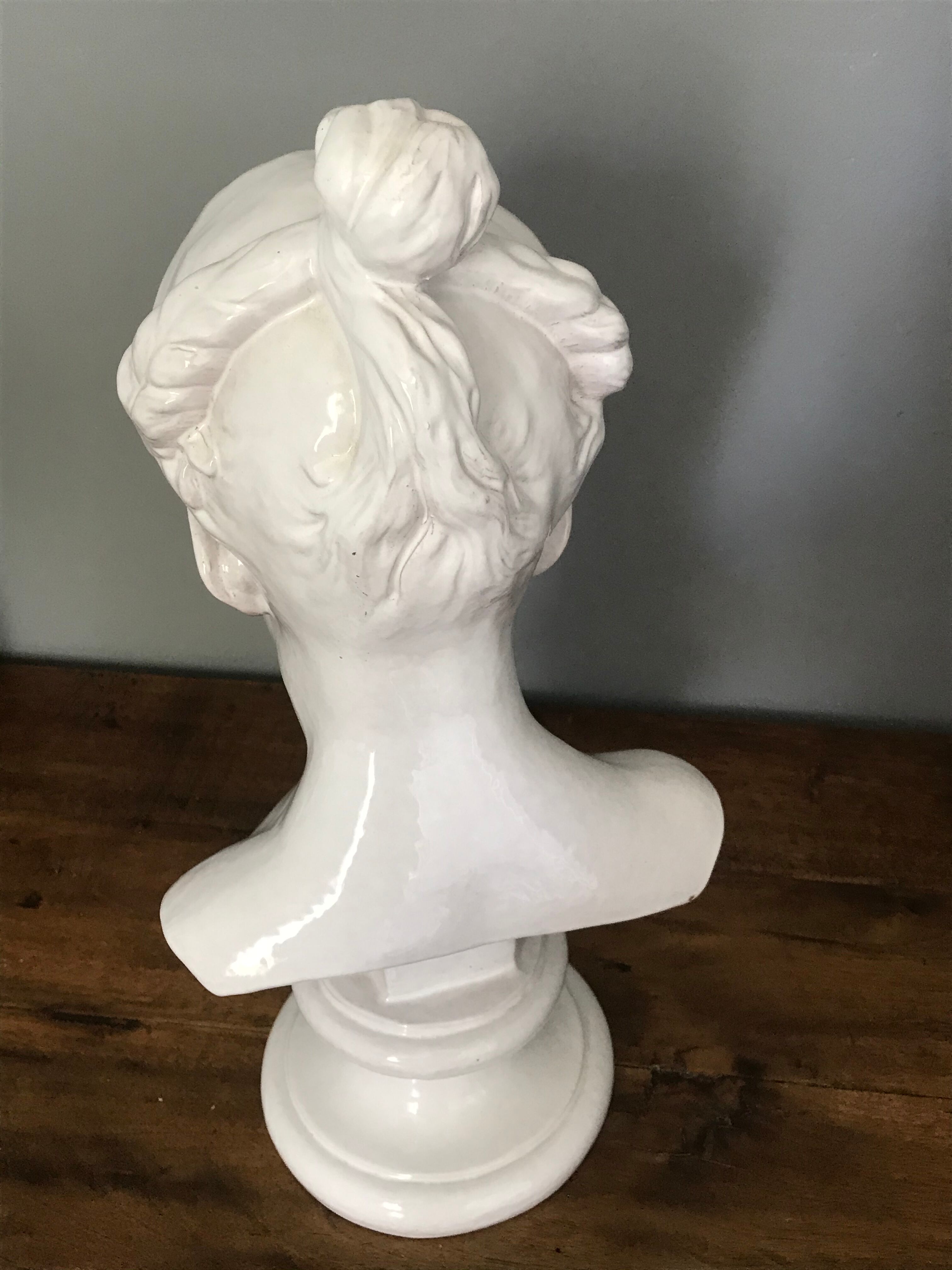 Child bust in enamelled terracotta