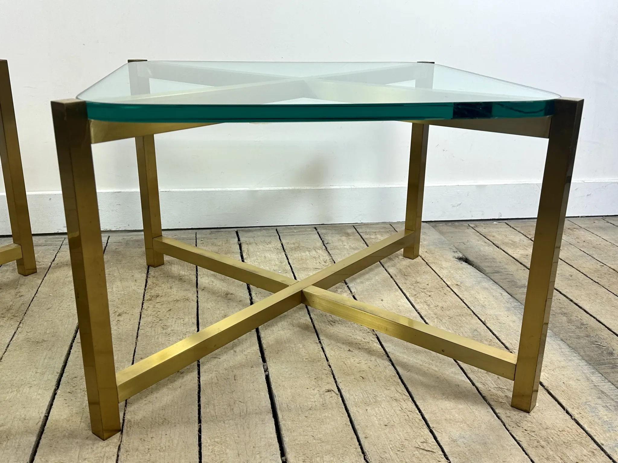 Pair of Italian brass and glass side tables from the 1970s.