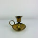 Vintage brass candlestick, rat of the cellar.
