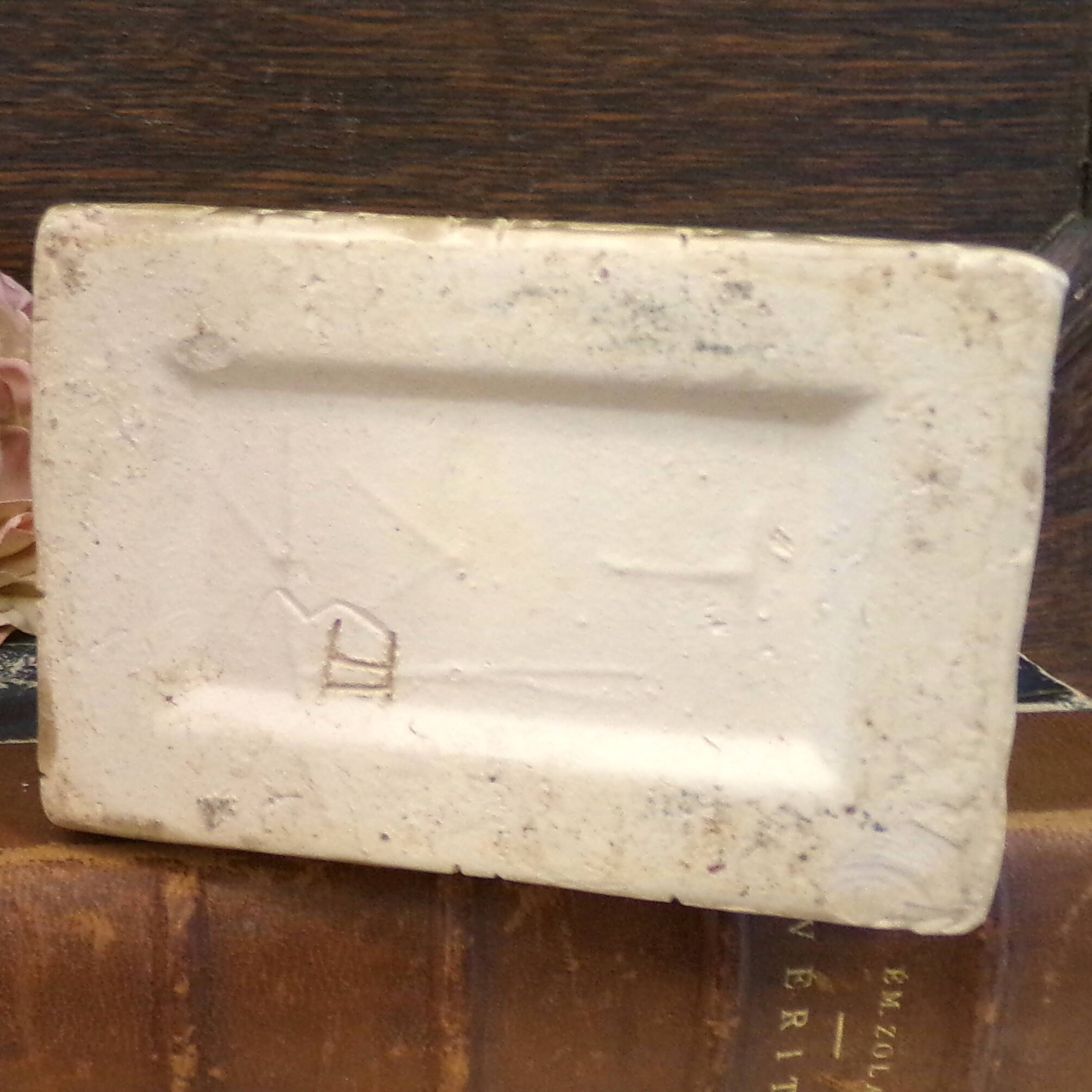 Small green ceramic elephant vase