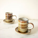 Pair of stoneware cups and sub-cups