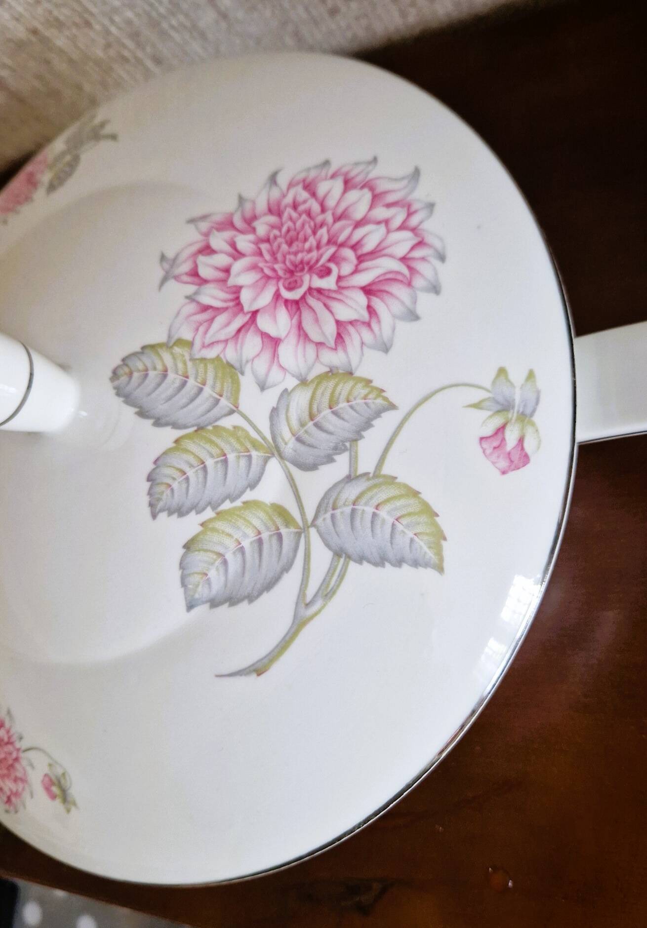 White porcelain soup tureen by Haviland with Dahlia patterns.