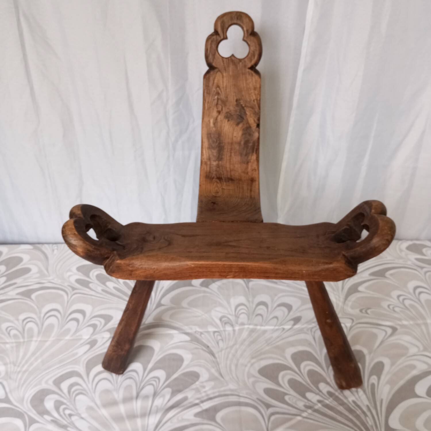 Brutalist tripod chairs in solid wood