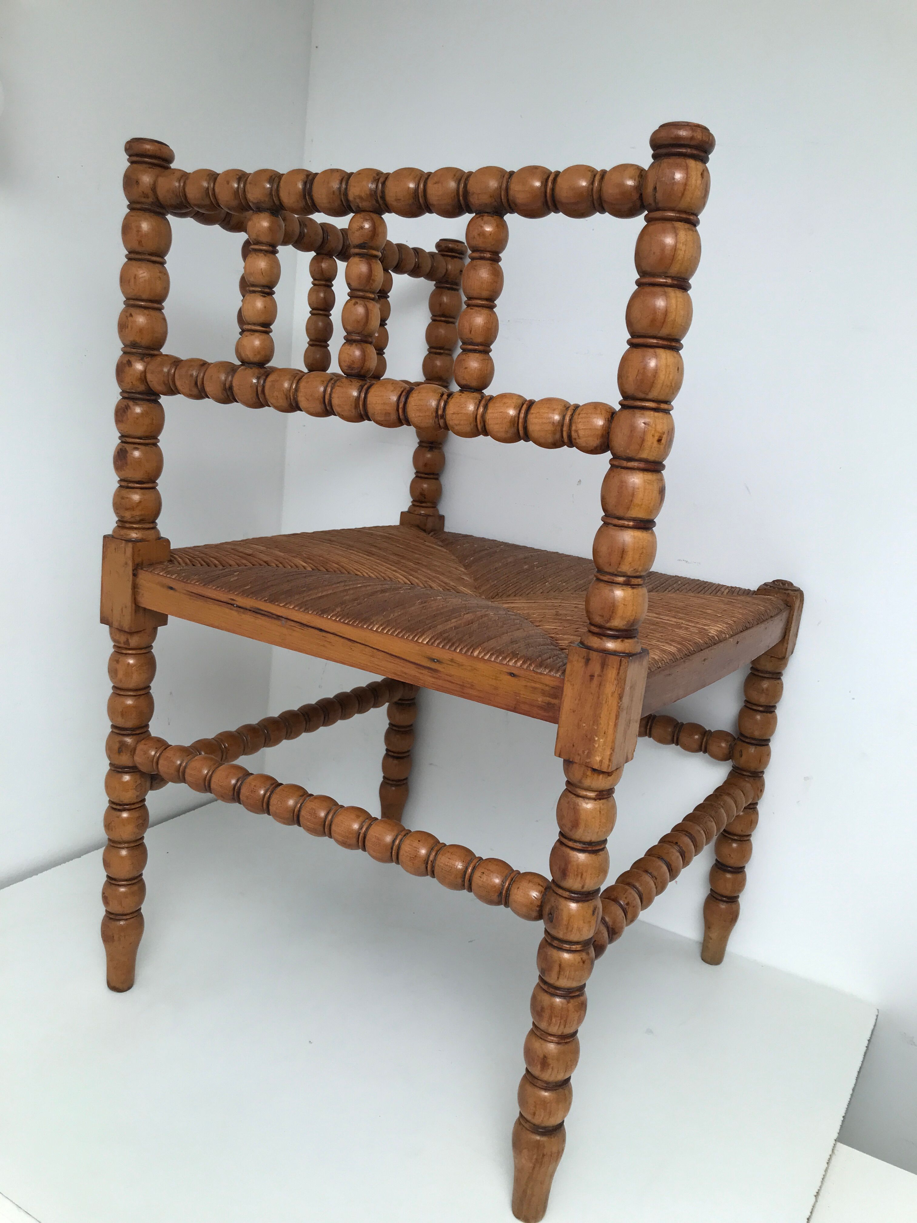 A wooden corner chair turned 1920s
