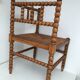 A wooden corner chair turned 1920s