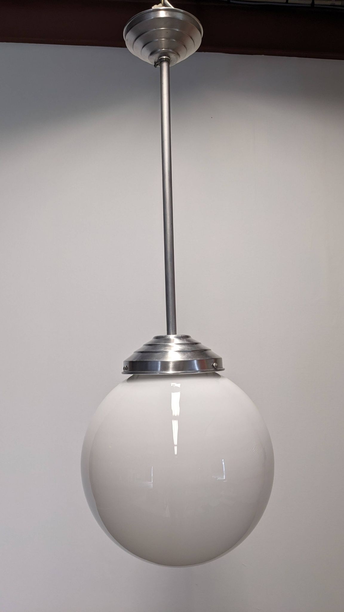 XL Art Deco white opaline ball pendant light, France circa 1920