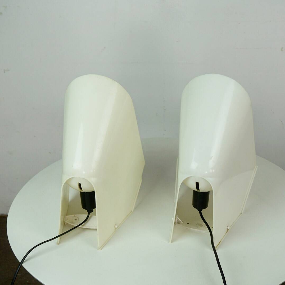 A pair of white plastic table lamps by Cini Boeri for Stilnovo, Italy.