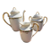 Set of jug, sugar bowl, and milk jug in Limoges porcelain by Paul Past.