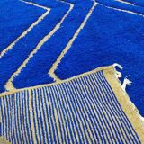 Tapis marocain bleu décoré 250cmx150cm