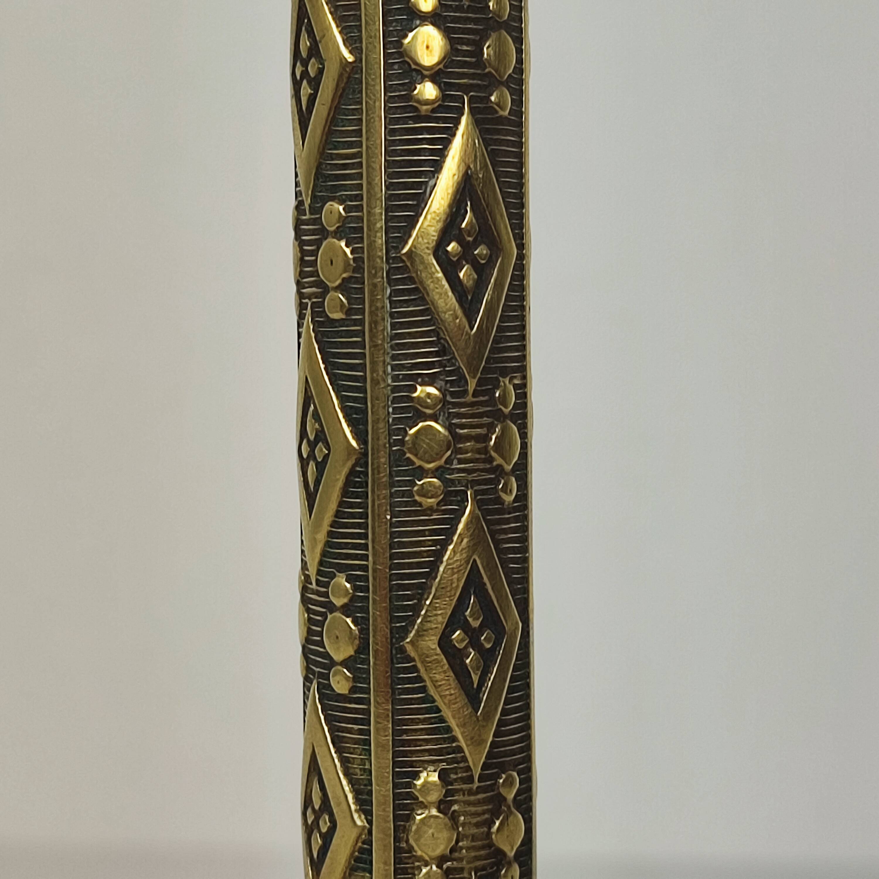 Gilt bronze candle holder