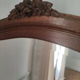 Hazed and carved wooden mirror