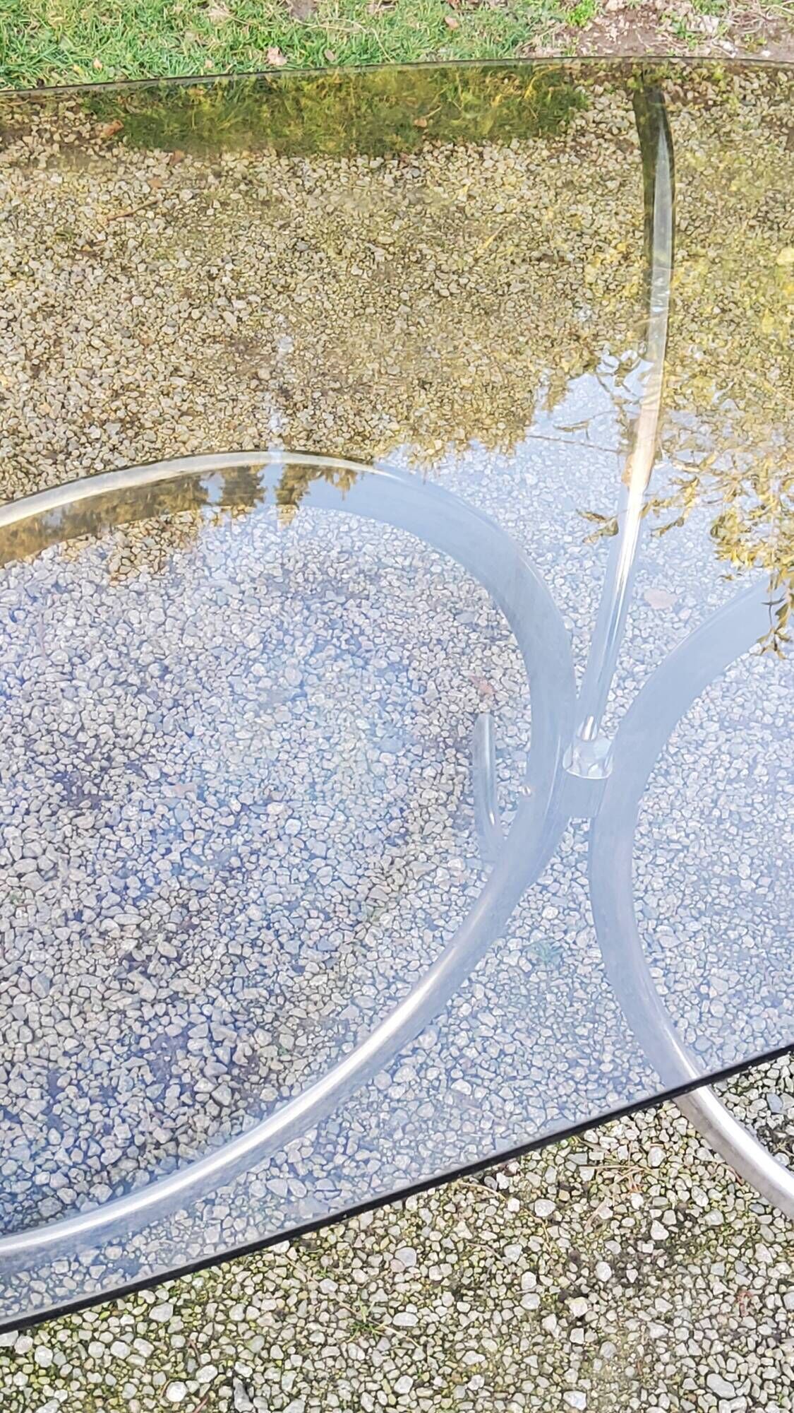 Designer table from the 70s, smoked glass top, chrome base
