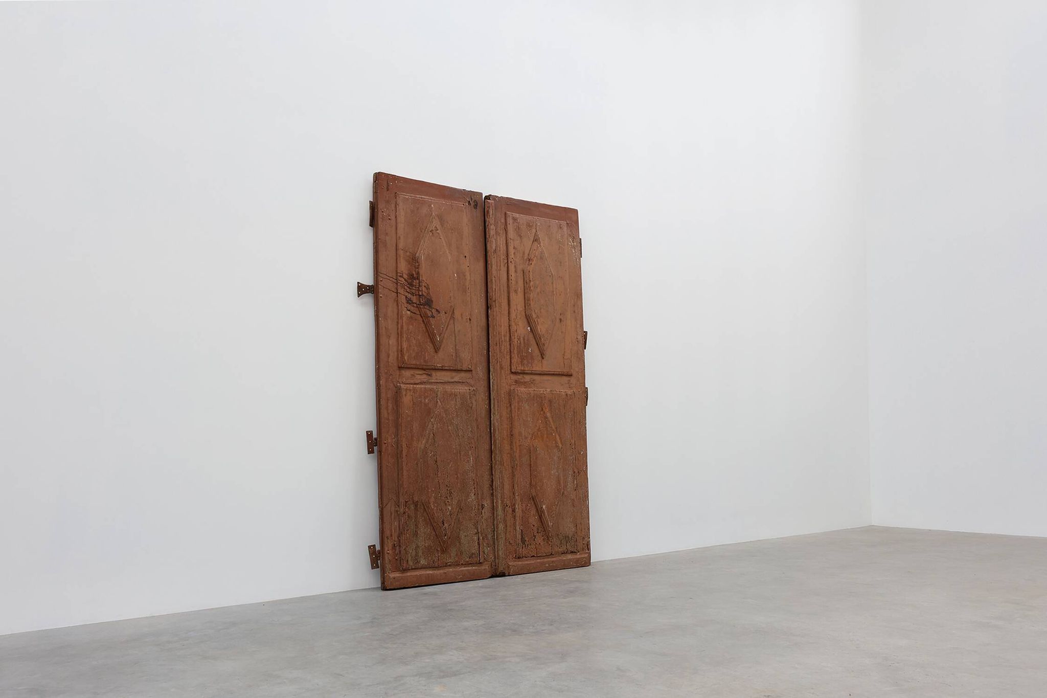 Large 17th century Monastery doors in terracotta lacquered oak, Portugal